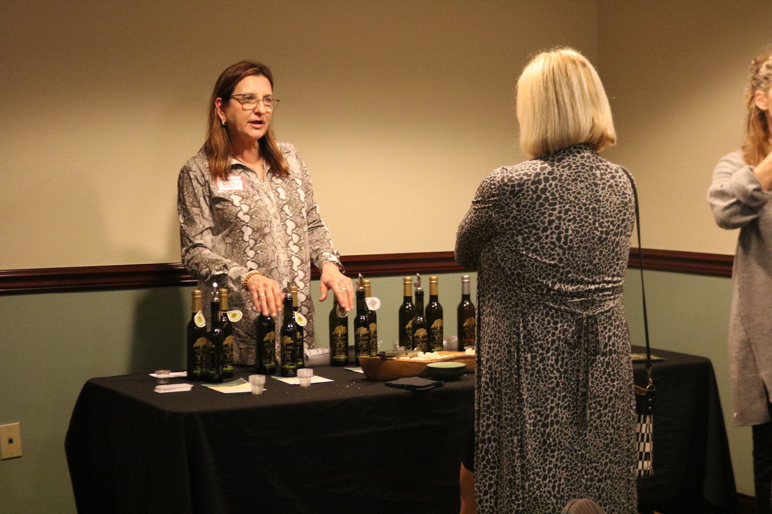 5.	Donna MacPherson explains the different types of olive oils of her Golden Isles business in St. Simons Island, Georgia.